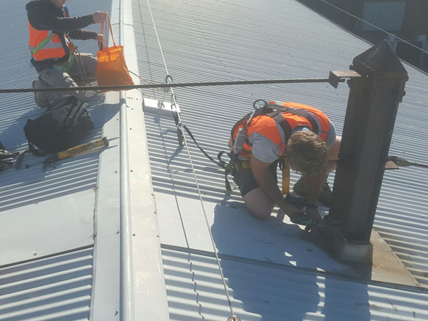 Support Crew dismantling the surrounding flashing to allow for the engineering assessment to take place.